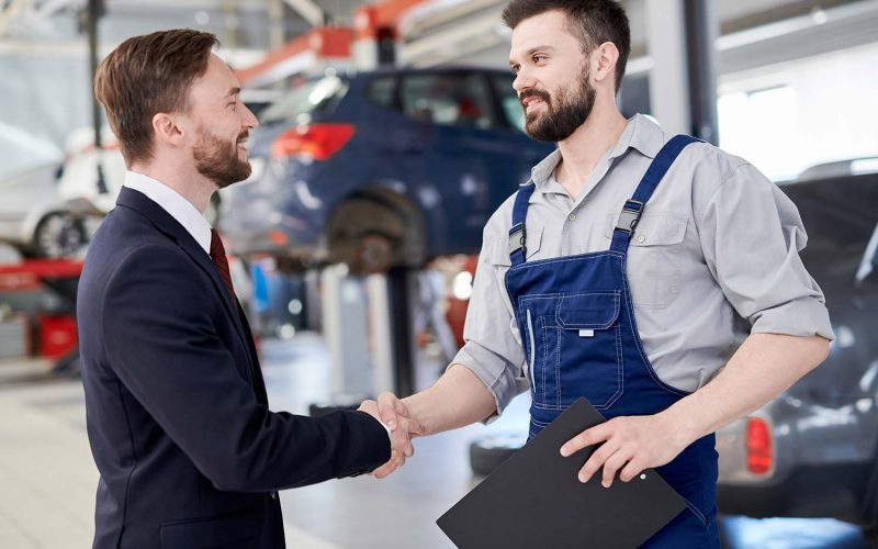 mechanic-shaking-hands-with-businessman-small-ot6jtn0lga5ngwdqdkrt5k8qqfavr04z4wkk194zuw